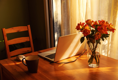 Laptop computer on table in home