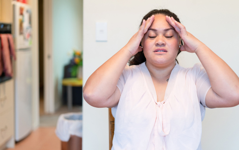 Woman in home taking a minute to herself